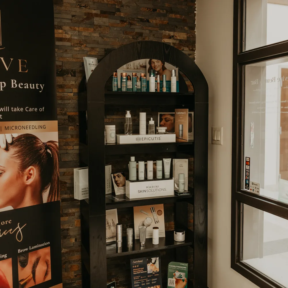 The skincare shelf at Revive Beauty Bar in Salinas, stocked with Epicutis, Jan Marini and SkinMedica